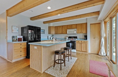 Honey Creek House | Lakefront |Private Sandy Beach & Pier |Blue Spring Lake |Fire Pit |Grill |Kayaks |Canoe |Paddle Boat