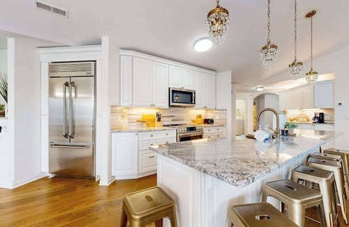 Lake Delton Condo | Lakefront resort townhome with resort pools/beaches, private deck, & fireplace