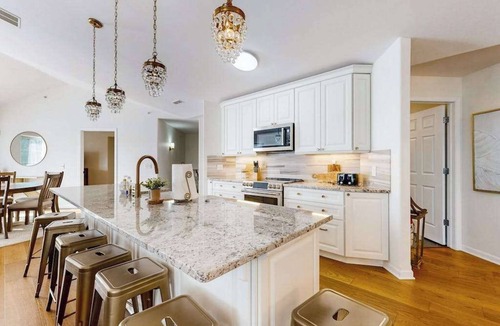Lake Delton Condo | Lakefront resort townhome with resort pools/beaches, private deck, & fireplace