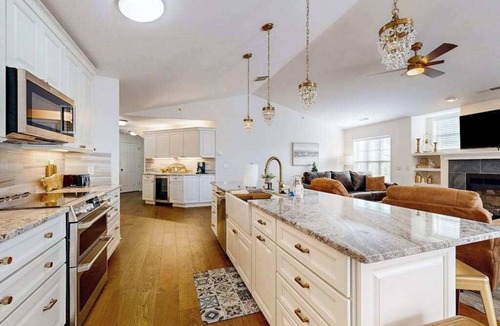 Lake Delton Condo | Lakefront resort townhome with resort pools/beaches, private deck, & fireplace