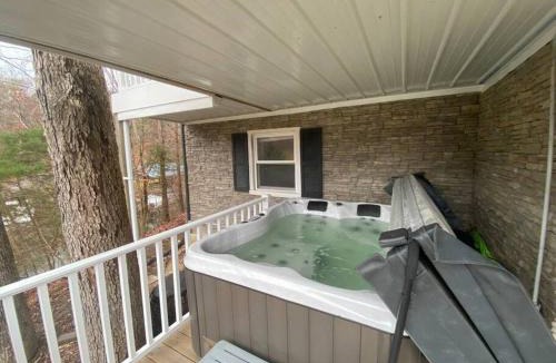 Goodview House | Lakefront Retreat with Game Room Hot Tub and Gym