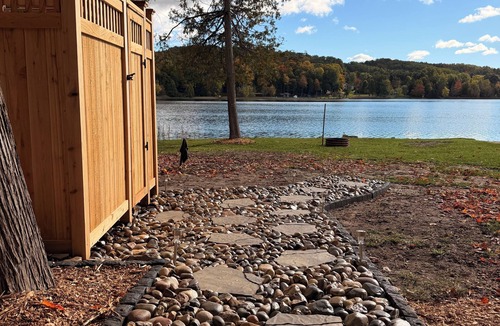 East Jordan Cabin | Lakefront Rustic Cabin Retreat with Outdoor Shower