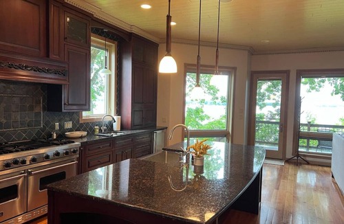 West Okoboji House | Lakefront Sunset Views w/Private Dock & Hoist