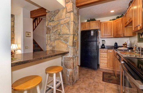 McHenry House | Lakefront Townhouse with Lake & Ski Access