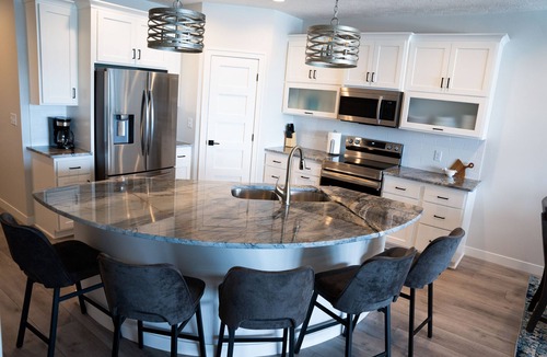 Arnolds Park Condo | Lakefront Views- New 5 Bedroom Luxury Condo on East Okoboji