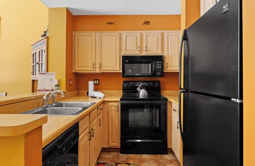 Lakeside Village Condo | Lakeside Condo w/Mountain & Lake Views from Balcony, Steps to Shops/Dining!