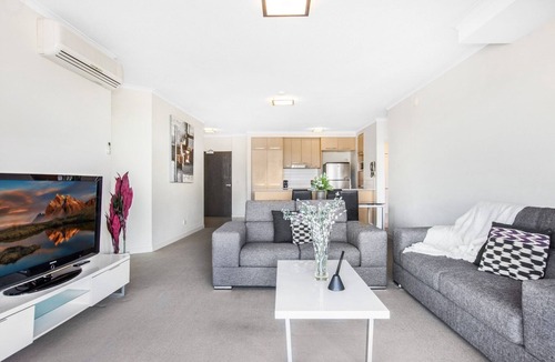 Merrimac Apartment | Lakeside Family Oasis with Pool, Gym and Balcony