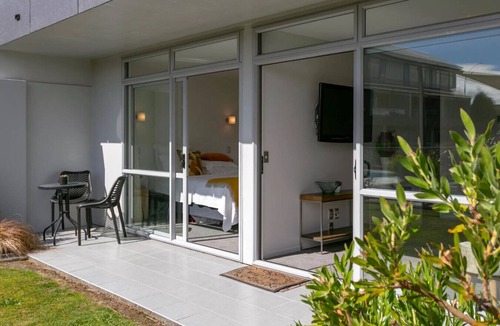 Two Mile Bay Apartment | Lakeside Gem: Your Modern Retreat