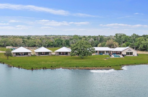 La Grange House | Lakeside Getaway: Pool, Games, Hot Tub, More!