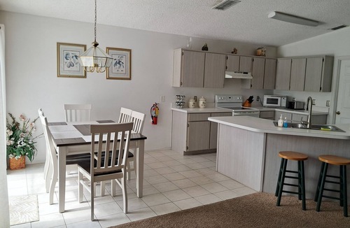 Windward Cay Villa | 'Lakeside Haven' Fantastic South Facing Pool, Spa and Stunning Lakeside Views.