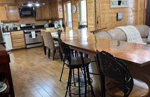 Greers Ferry Cabin | Lakeside Lodge for family fun with game room and covered deck! Fish & Swim!