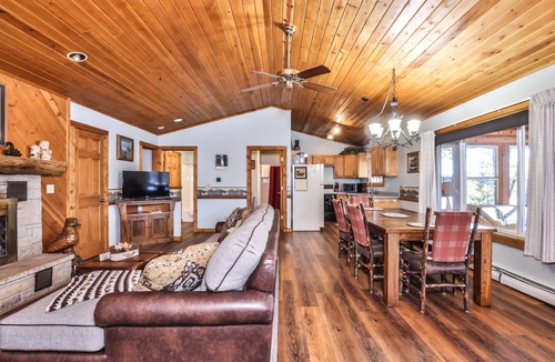 St Germain Cabin | Lakeside resort cabin right on Little Saint with dock, sandy beach, firepit!