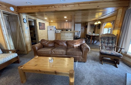 St Germain Cabin | Lakeside resort cabin right on Little Saint with dock, sandy beach, firepit!