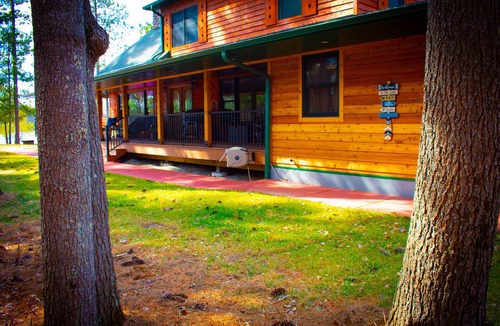 Neillsville Cabin | Lakeside Retreat with Private Docks, Hot Tub, Scenic Views and Near Trails