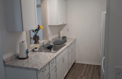Lakeside House | Lakeside Retreat with Big Porch, Extra Parking, and Prime Downtown Location