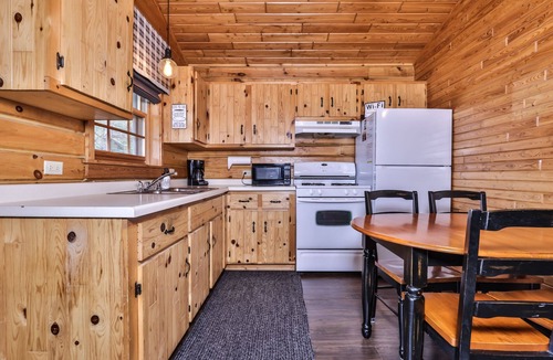 Watersmeet Cabin | Lakeside wilderness resort cabin with dock, fire pit, on-site store, bait shop!