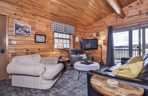Watersmeet Cabin | Lakeside wilderness resort cabin with dock, fire pit, on-site store, bait shop!