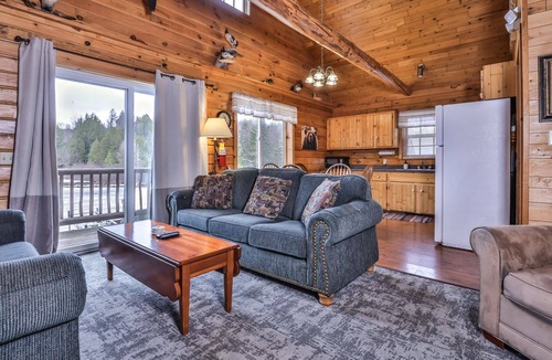 Watersmeet Cabin | Lakeside wilderness resort cabin with dock, fire pit, on-site store, bait shop!