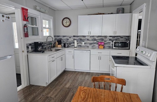 Shawano Cottage | Lakeview Bliss: Shawano Getaway - Short walk to public beach and park