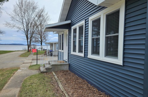 Shawano Cottage | Lakeview Bliss: Shawano Getaway - Short walk to public beach and park