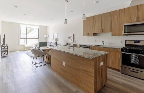 Carteret Apartment | Landing | Chic 1BD, Rooftop Lounge, Gym