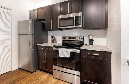 McNeil Apartment | Landing | Modern 1BD, Yoga Studio, Game Room