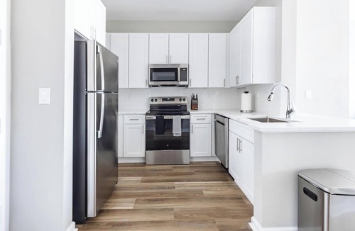 Raritan Apartment | Landing | Modern 2BD, Courtyard, Game Room