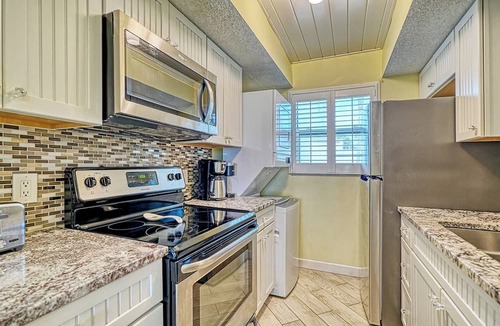 Longboat Key Apartment | LaPlaya 105B-Relax on the balcony and watch the dolphins swim by!