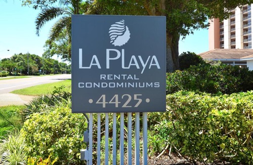 Longboat Key Apartment | LaPlaya 202E Catch the gentle Gulf breezes on your private balcony beneath the swaying palms