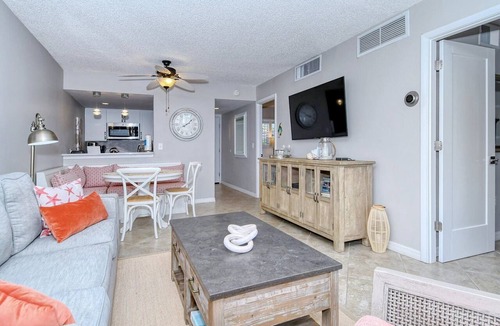 Longboat Key Apartment | LaPlaya 202E-Catch the gentle Gulf breezes on your private balcony beneath the swaying palms.