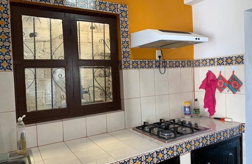De Guadalupe House | Large colonial house with garden in downtown area
