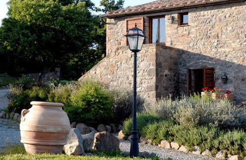 Radicofani Apartment | Large apartment with garden in an old farmhouse with swimming pool