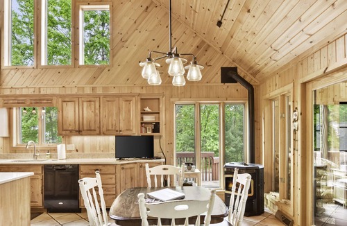 St Germain House | Large home Big Sant Germain Lake sleeps 13 breathtaking views of the sunset.