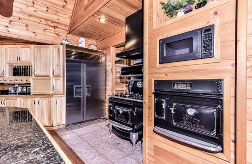 Three Lakes House | Large lakeside log home with air-hockey, foosball, dock, enclosed porch, firepit