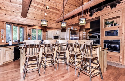 Three Lakes House | Large lakeside log home with air-hockey, foosball, dock, enclosed porch, firepit