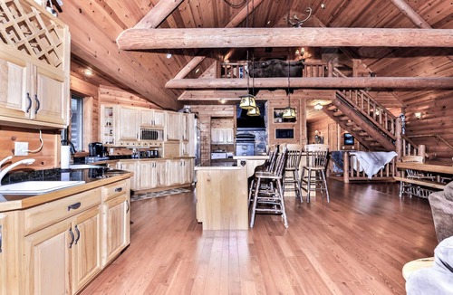 Three Lakes House | Large lakeside log home with air-hockey, foosball, dock, enclosed porch, firepit
