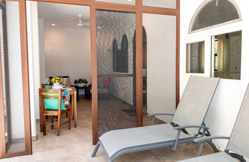 Puerto Morelos Apartment | Large studio with king bed, full kitchen, sofa bed. Half wall separating.