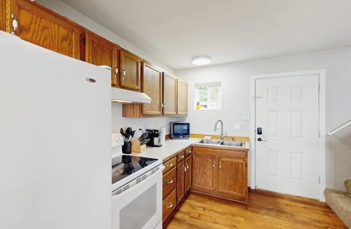 Clinton House | Large waterfront estate with main house, townhouse w/hot tub + studio cottage