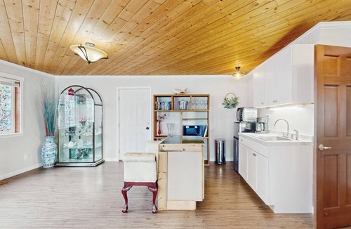Clinton House | Large waterfront estate with main house, townhouse w/hot tub + studio cottage