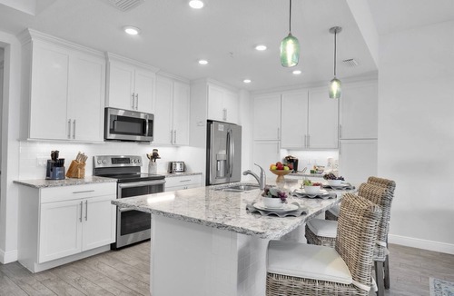 Whitney Beach Condo | Latitude Adjustment Penthouse by Coastal Chic Vacations