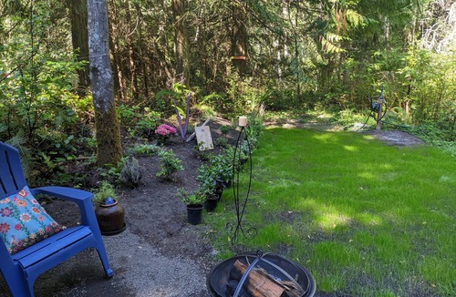 Sequim RV Rental | Lavender Glamping Tent with heater , mini fridge and fire pit.