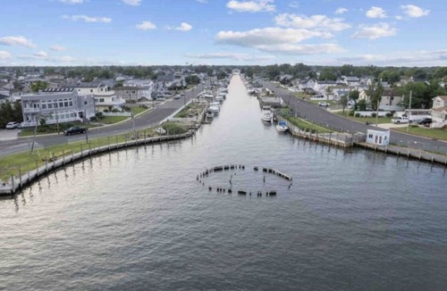 Copiague House | Laylas beach waterside private 3 bedroom entire home backyard access beach view
