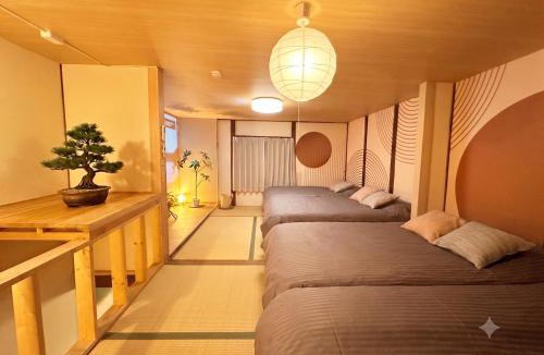 Taisho-ku Apartment | LEON RESORT HOTEL Max 13 people,5min walk Taisho Station,6 min from Shinsaibashi,9 min from Namba Dotonbori,14 min from Universal Studios Japan,Excellent location, entire detached house for private 最大13名 京セラドーム 梅田 難波 USJ 大阪観光