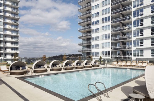 South Lake Union House | Level Seattle - Well Appointed Deluxe One Bedroom Suite + Office. Full Epicurian Kitchen and in suite laundry.
