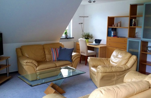 Plau am See Apartment | Light and friendly roof apartment with a patio and balcony