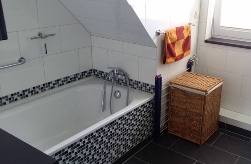 Plau am See Apartment | Light and friendly roof apartment with a patio and balcony