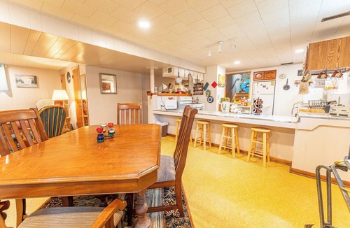 Iron River House | Lighthouse on the Rock: Sunshine and Serenity Await This Summer