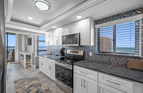 Sand Key Condo | 🐬Lighthouse Towers #1501- Water views galore - Amazing Gulf and Intercoastal views!