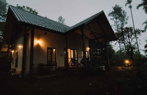 Vayittiri House | Lillis Tea Hostel, A mountain bungalow conjures images of a cozy, rustic retreat