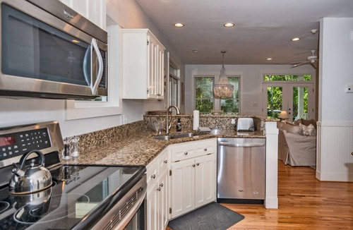 Bald Head Island Cottage | Live oak views from this 3 bedroom cottage; 2 golf carts and peaceful screened in porch